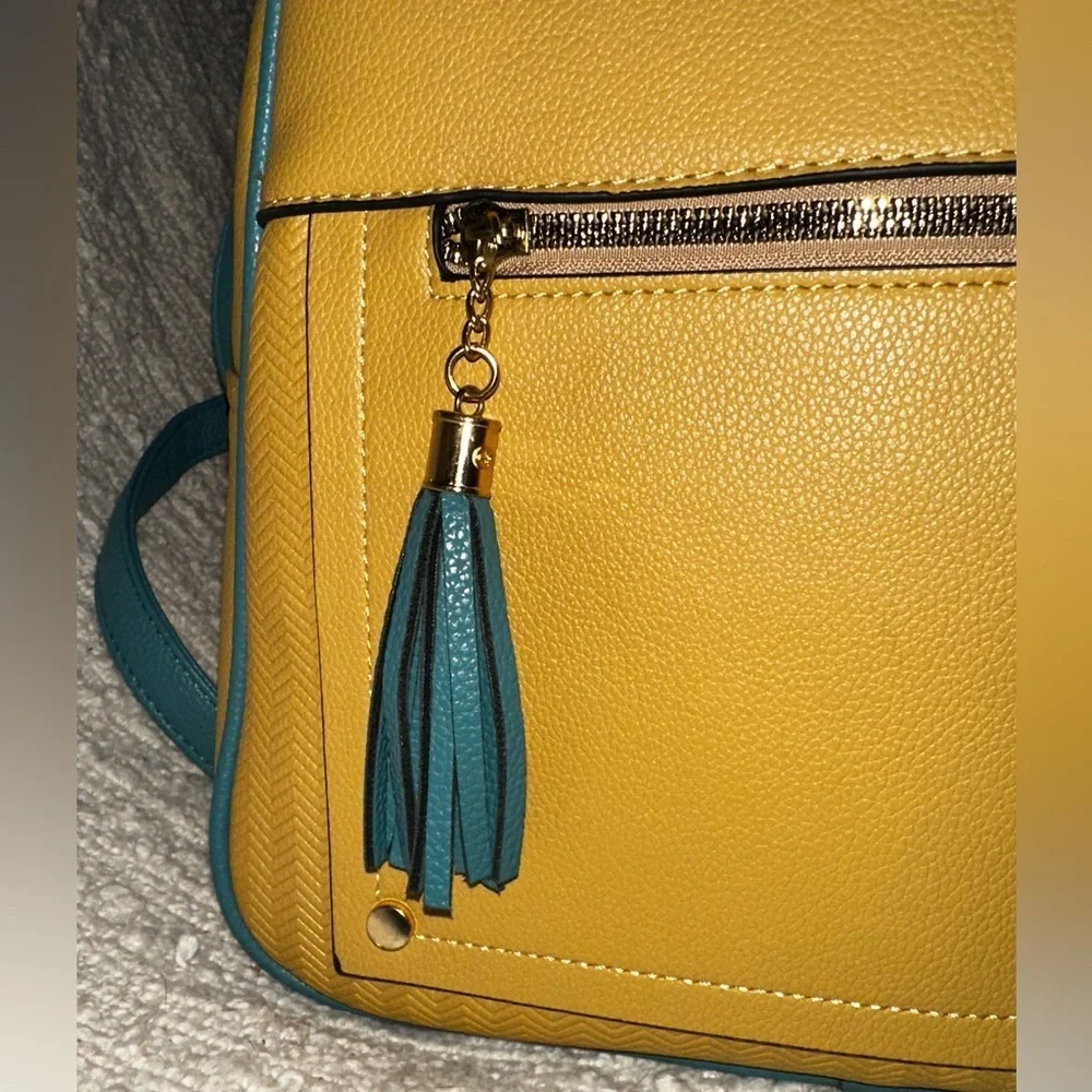 UEC MONTANA WEST Backpack Purse Anti-Theft Backpack with secured zipper & tassel